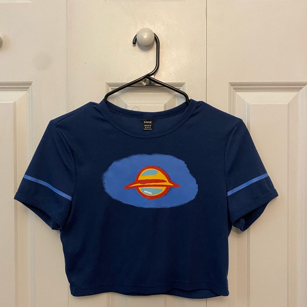 Selling this little cute planet crop top!